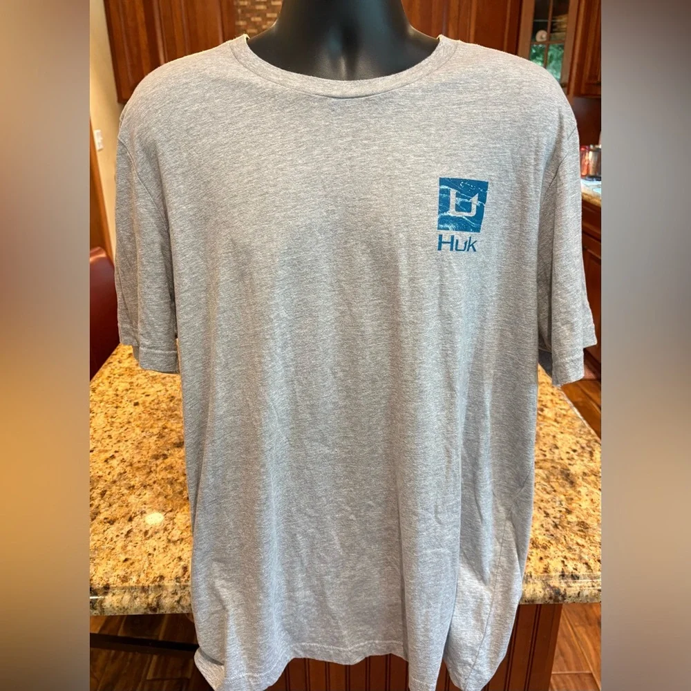 Huk men’s Outer Banks Angler t-shirt. Sharp blue print w/logos front/back/sleeve